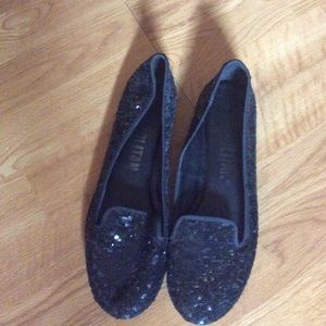 Black sequin flats.